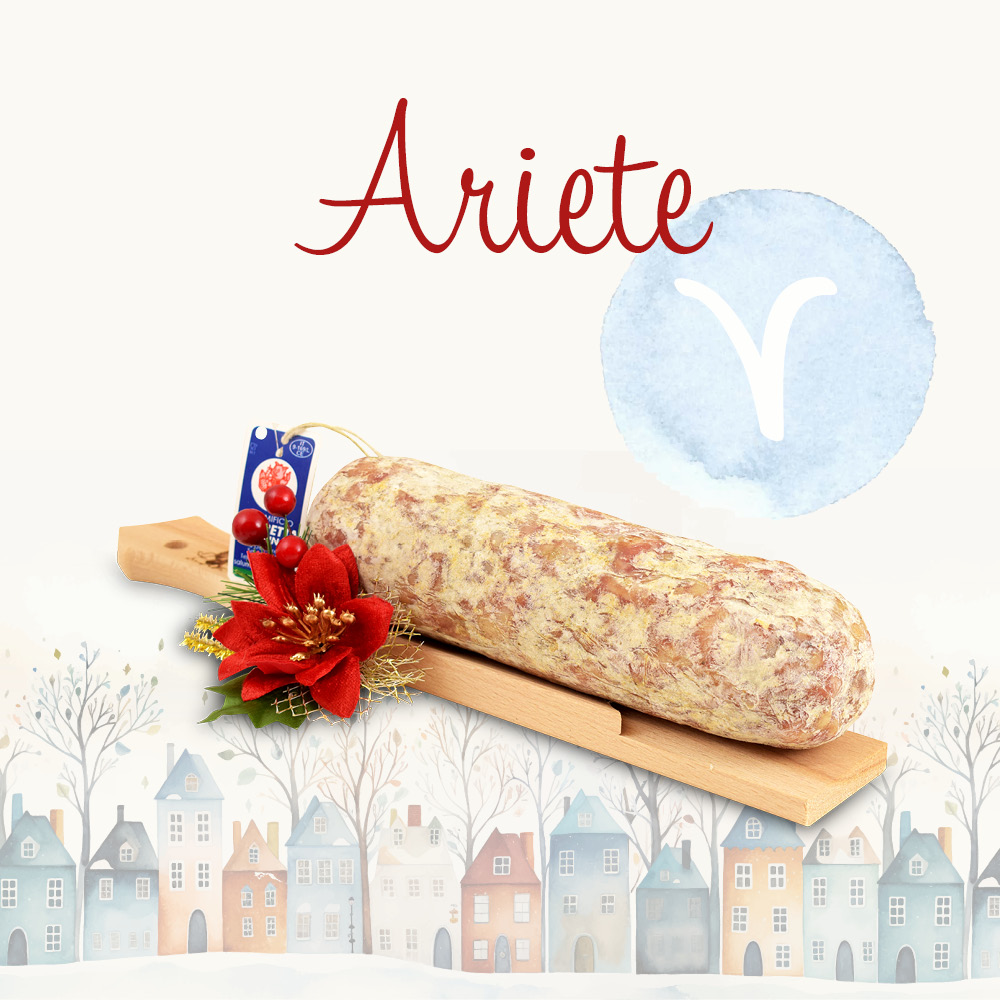 Cesto natalizio contenente prodotti alimentari in una confezione decorata e la scritta "Ariete"