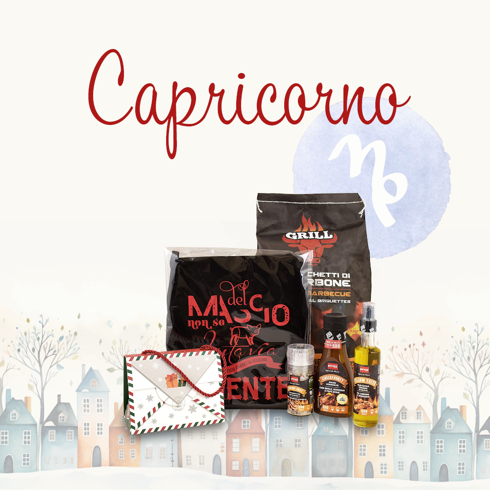 Cesto natalizio contenente prodotti alimentari in una confezione decorata e la scritta "Capricorno"