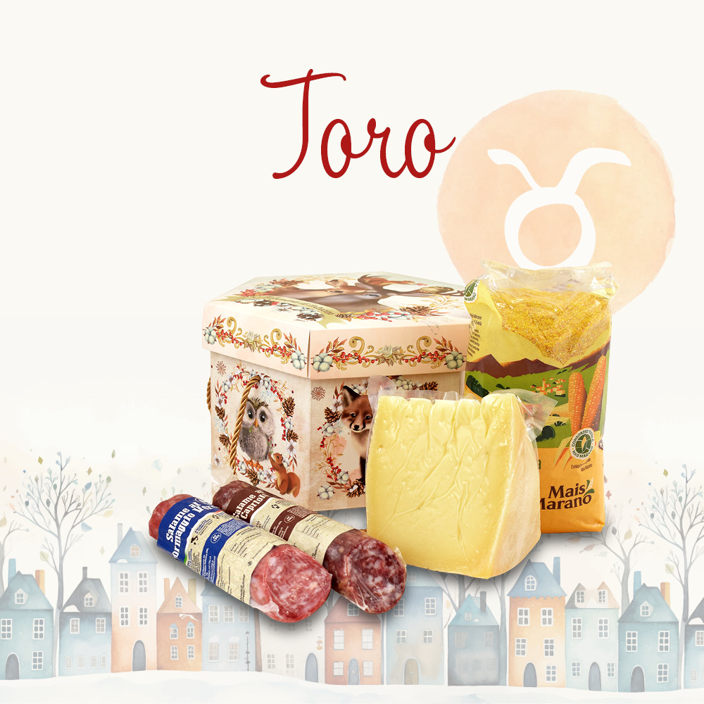 Cesto natalizio contenente prodotti alimentari in una confezione decorata e la scritta "Toro"